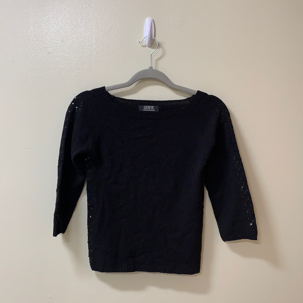 Black dress slightly off the shoulder sweater.